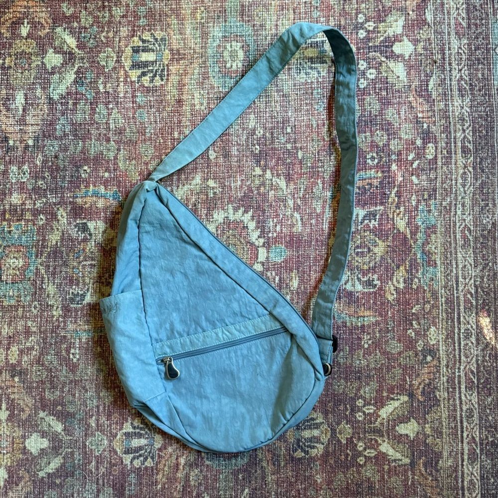 Ameribag light blue crossbody Sling Bag healthy backpack multi pocketed
